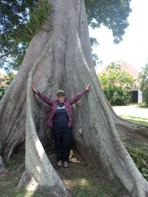 Erika standing in front of a tree